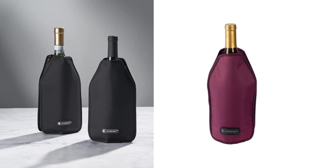 Le Creuset wine sleeves in black on two separate bottles, and a burgundy sleeve on a single bottle.